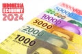 Indonesia economy 2024 text with all nominal rupiah money currency on eh background