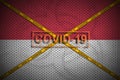 Indonesia flag and Covid-19 stamp with orange quarantine border tape cross. Coronavirus or 2019-nCov virus concept