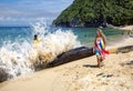 Woman with a curly hair on the Indian ocean shore