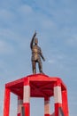 Indonesia, March 15, 2024 - Bronze statue of Soekarno holding a stick under the blue sky