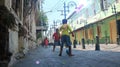 Indonesia, Semarang - June 21, 2019, child playing soccer in the alley Royalty Free Stock Photo