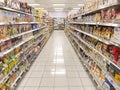 Indonesia, 2023-11-08: supermarket corridor with various kinds of products displayed in the window. retail store. rack. supply