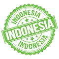 INDONESIA text on green round stamp sign
