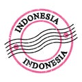 INDONESIA, text on pink-black grungy postal stamp