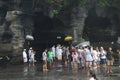 Indonesia : Tourist take photo and sightseeing at Pura tanah lot temple famous place in Bali Indonesia Royalty Free Stock Photo