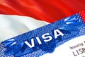 Indonesia Visa in passport. USA immigration Visa for Indonesia citizens focusing on word VISA. Travel Indonesia visa in national Royalty Free Stock Photo