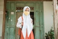 Indonesian asian primary student wearing a masks