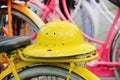 Indonesian bicycles for rent in Jakarta, yellow hat . Java, Indonesia. Royalty Free Stock Photo