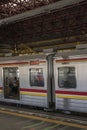 Indonesian commuters wait inside the cars at the station in Jakarta