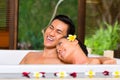 Indonesian couple having wellness bath in spa