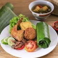 Nasi Timbel Komplit, Traditional Sundanese Rice Wrapped with Banana Leaf