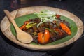 Indonesian dish from Jakarta - Oseng Kikil Mercon Kecap, dish from stir-fried cowhide