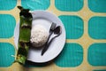 Indonesian dish PEPES IKAN closed in banana leaf - top view with rice and copy space right