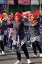 Indonesian do a flash mob traditional dance to celebrate national education day