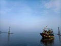 Indonesian fishing boats on clear seas and clear clouds.