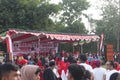 The Indonesian flag lowering ceremony witnessed by villagers. Indonesia Independence Day