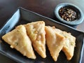 Indonesian food called & x22;mendoan& x22; comes from soybean tempeh fried flour served with sweet soy sauce and sliced chili