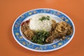 Indonesian food cuisine called ` Nasi Ayam Penyet `