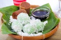 Indonesian Food Klepon with coconut on banana leaf Royalty Free Stock Photo