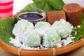 Indonesian Food Klepon with coconut on banana leaf Royalty Free Stock Photo