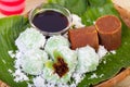 Indonesian Food Klepon with coconut on banana leaf Royalty Free Stock Photo