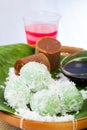 Indonesian Food Klepon with coconut on banana leaf Royalty Free Stock Photo