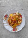 Indonesian fruits salad or Rujak , variety of fruits served with hot and sweet sauce