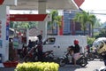 Indonesian buying fuel on gas station Royalty Free Stock Photo