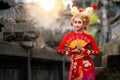 Indonesian girl with traditional costumn dance in bali temple