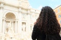 Girl taking photos of Fontana di Trevi