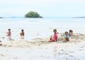 Indonesian kids playing on beach