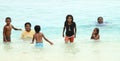 Indonesian kids playing in sea