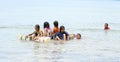 Indonesian kids playing in sea