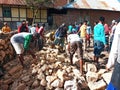 Indonesian local people working together building neighbor's house, Asian male construction workers and labor day Royalty Free Stock Photo