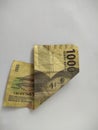 Indonesian paper money on white background.folded banknotes, business concept