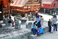 Indonesian people and foreign travelers travel visit Batu Kursi Raja Siallagan or Stone Chair of King Siallagan in Tomok city in Royalty Free Stock Photo