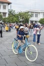 Indonesian people rent bikes and ride them around at Fatahillah Square in Jakarta, Indonesia Royalty Free Stock Photo