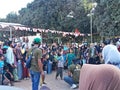 Indonesian people are watching a competition "Lomba Makan Kerupuk" in celebrating Indonesia's Independence Day Royalty Free Stock Photo