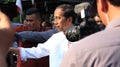 Indonesian President Joko Widodo ora Jokowi when visiting a traditional market Royalty Free Stock Photo