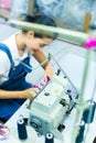 Indonesian seamstress in a textile factory Royalty Free Stock Photo