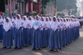 Indonesian senior high school students with uniforms, marching to celebrate Indonesian independence day