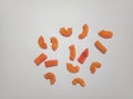 Indonesian spicy macaroni snack on a white paper background