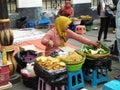 Indonesian street vendor woman selling food