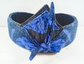 Indonesian Sundanese traditional headband. blue, isolated on white background.