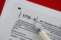 Indonesian tax form 1770-2 Individual Income Tax Return and pen on table Royalty Free Stock Photo