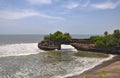 Indonesian temple on sea coast. Tanah lot complex. Royalty Free Stock Photo