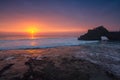 Indonesian temple in sea with tourist. Tanah lot complex. Bali. Royalty Free Stock Photo