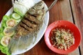 Indonesian traditional dish, fried fish complete with fresh vegetables. Royalty Free Stock Photo