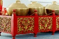 Indonesian traditional musical instruments.A metal drum. Red twisted stand