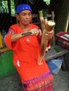 Indonesian Woman Carving Traditional Meal Papiong